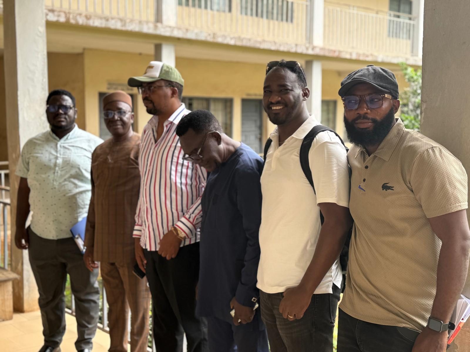 With colleagues during a facility visit