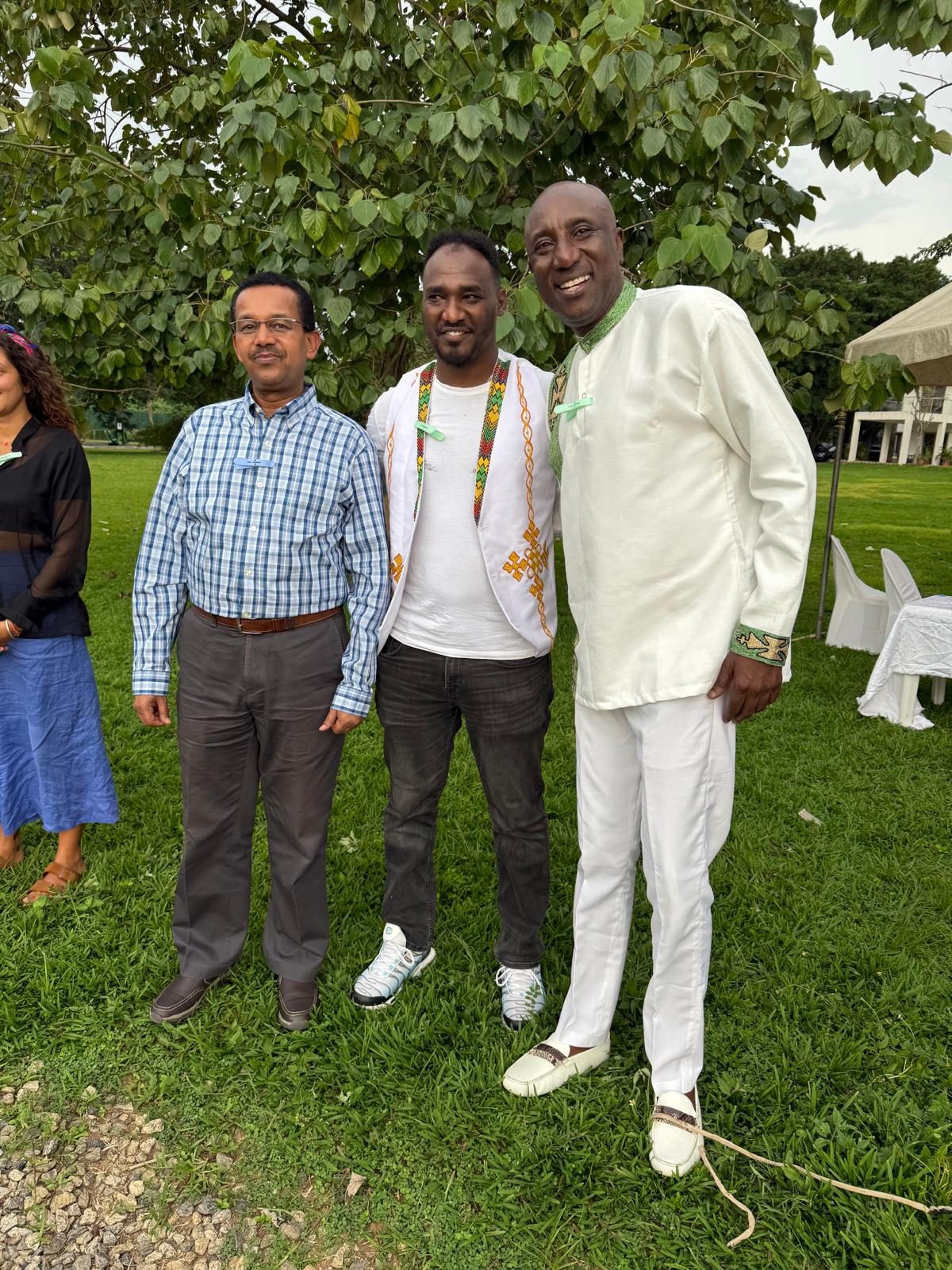 With colleagues in a garden
