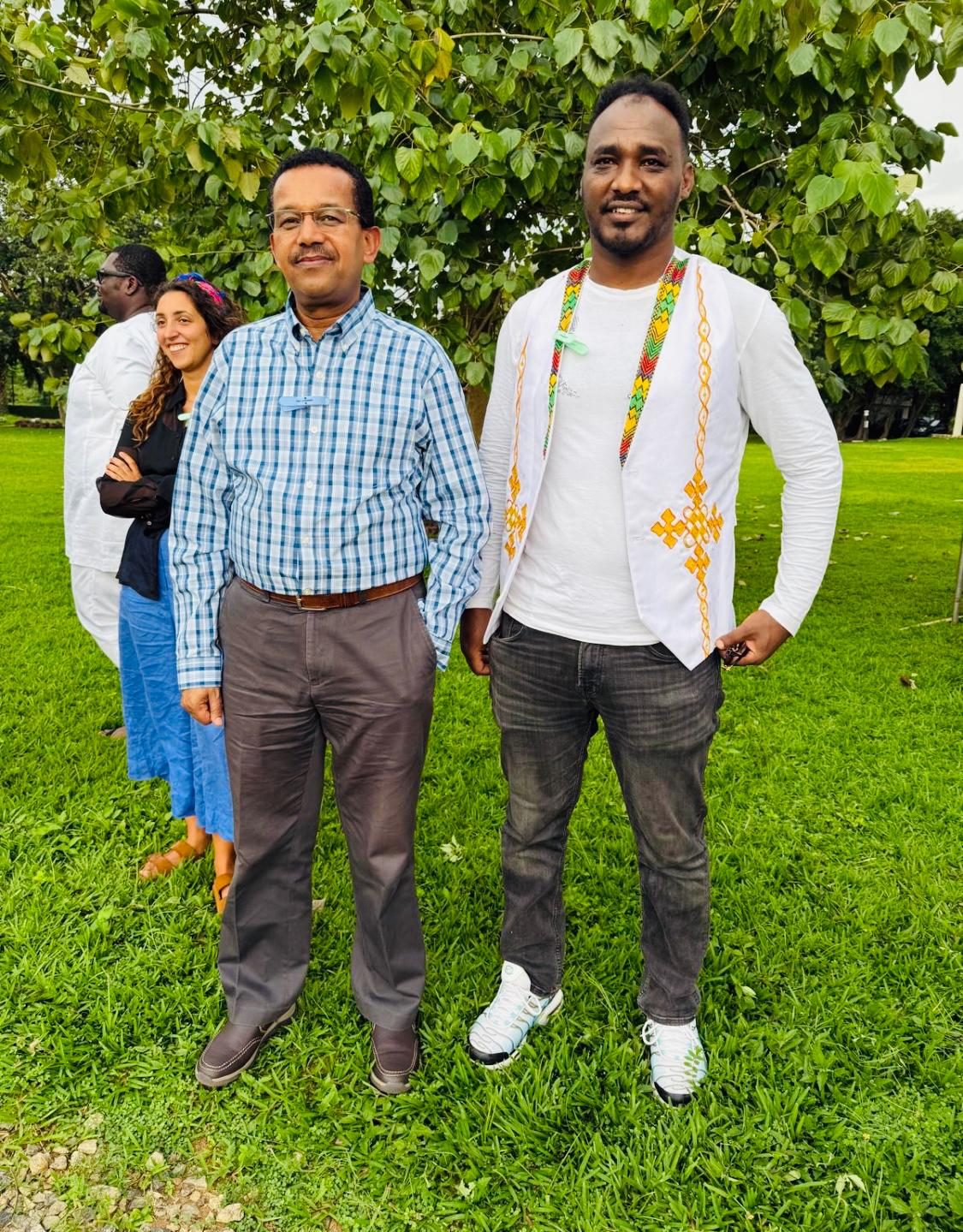With colleagues outdoors