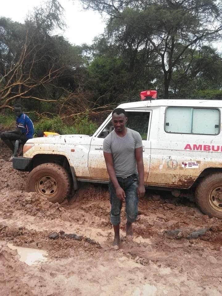 Field vehicle on a muddy access road