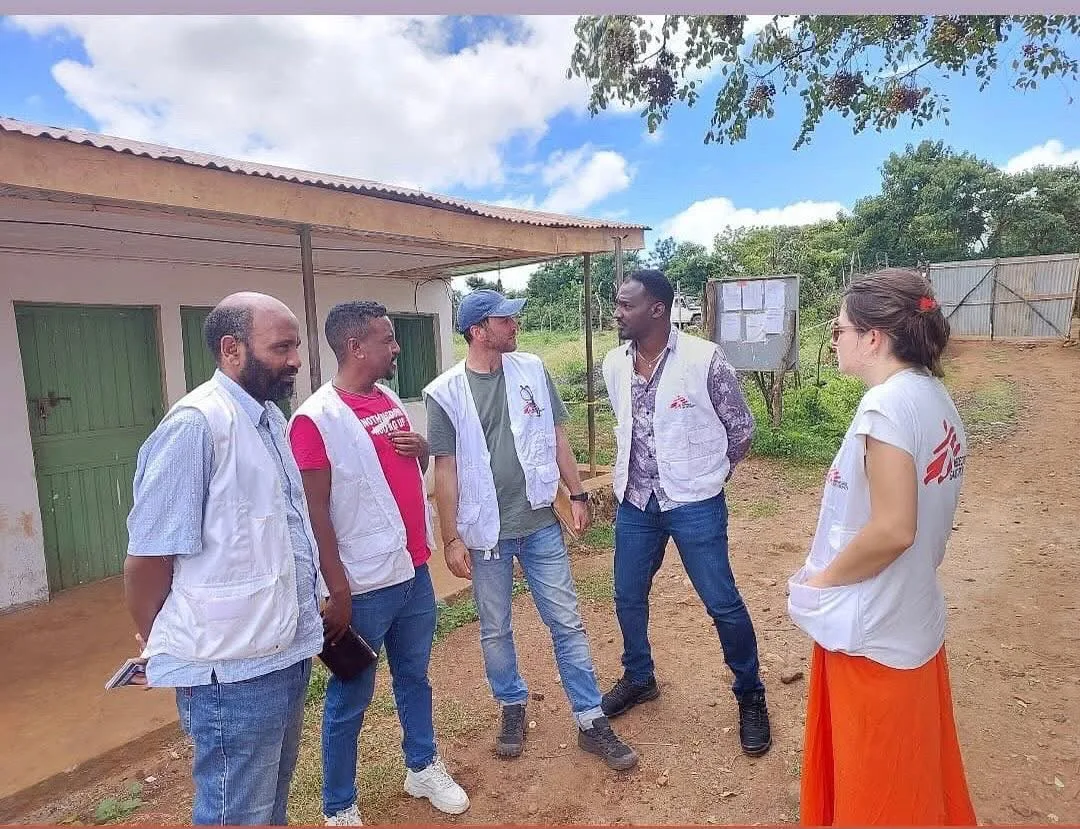In discussion with colleagues at a health facility