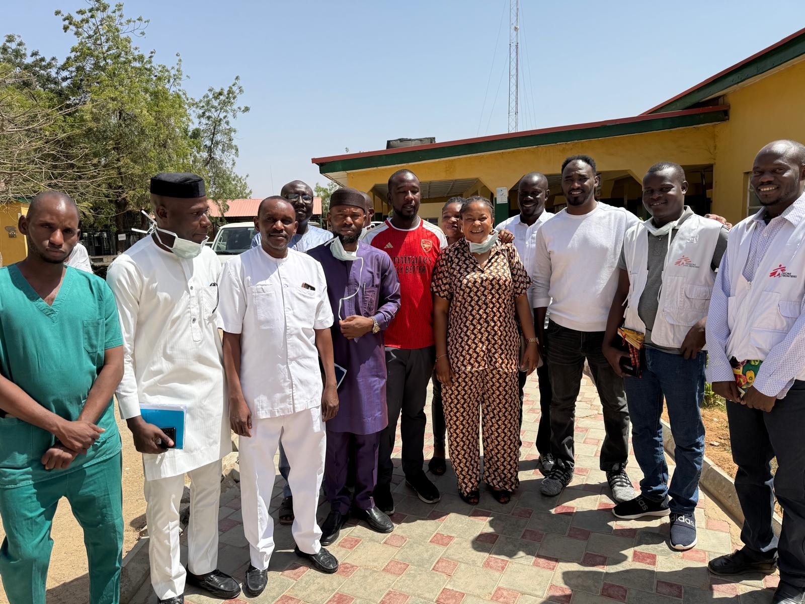 With colleagues and partners at a health facility